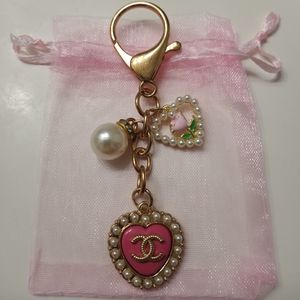 Luxury charm pink rhinestone heart button on an unbranded keychain